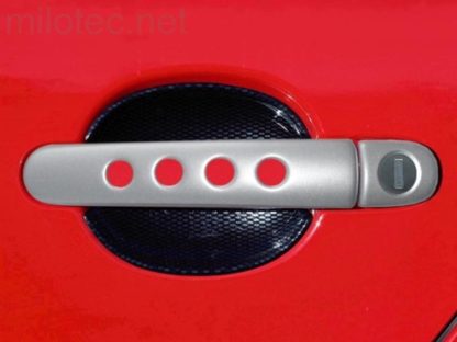 Kryty klik – děrované, stříbrné matné, (2+2 ks jeden zámek), Roomster 2006-2010 / Roomster Facelift od r.v. 04/2010